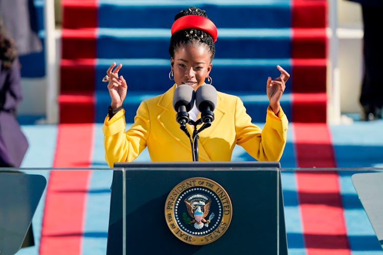 American poet Amanda Gorman reads a poem during the 59th Presidential Inauguration at the US Capitol...