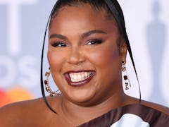 LONDON, ENGLAND - FEBRUARY 18: (EDITORIAL USE ONLY) Lizzo attends The BRIT Awards 2020 at The O2 Are...