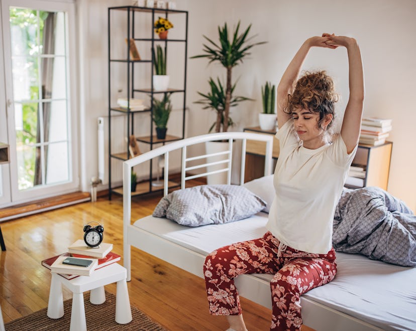 These 10 gentle stretches to do before you get out of bed will start your day off right.
