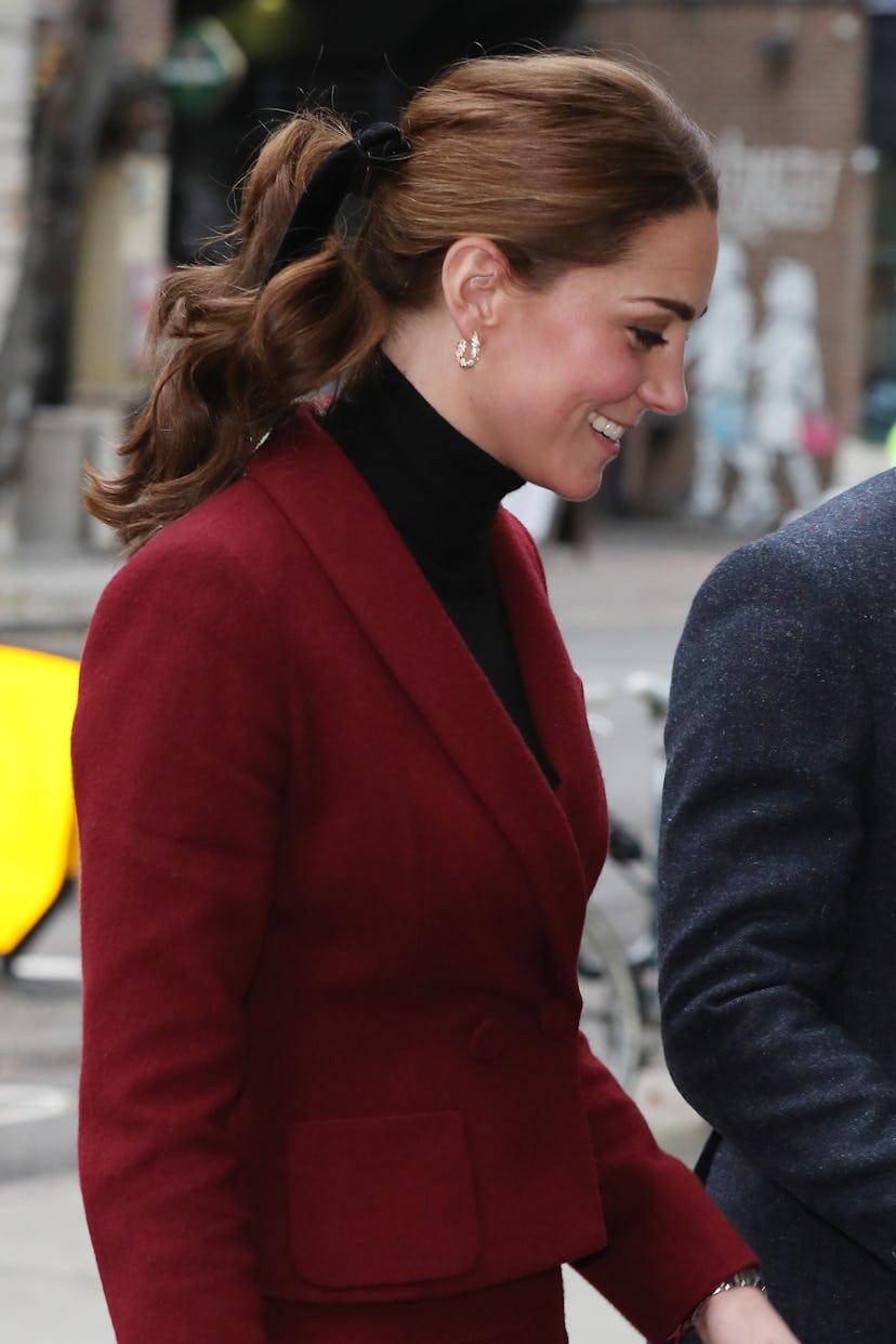 Kate Middleton's ponytail is one of her best hairstyles. Catherine, Duchess of Cambridge visits a UC...