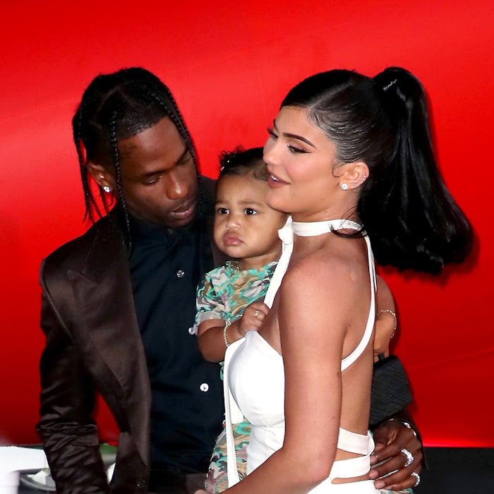 SANTA MONICA, CALIFORNIA - AUGUST 27: (L-R) Travis Scott, Stormi Webster, and Kylie Jenner attend th...