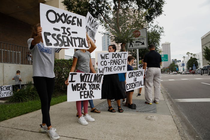 TAMPA, FL - JULY 27: Families protest any potential mask mandates before the Hillsborough County Sch...