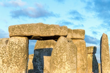 20th JUNE 2019 - SALISBURY, UK - Close-up of the ancient stone circle of Stonehenge, brightly lit by...