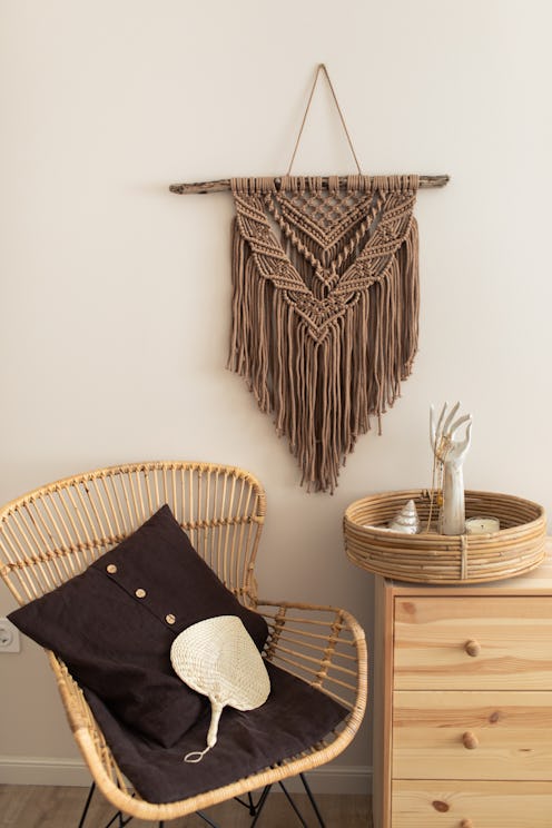 Stylish trendy eco accessory for home. Handmade natural cotton macrame derocation, bamboo arm chair ...