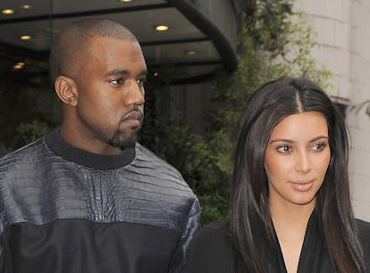 LONDON, ENGLAND - MAY 22: Kim Kardashian and her boyfriend Kanye West leave their hotel on May 22, 2...