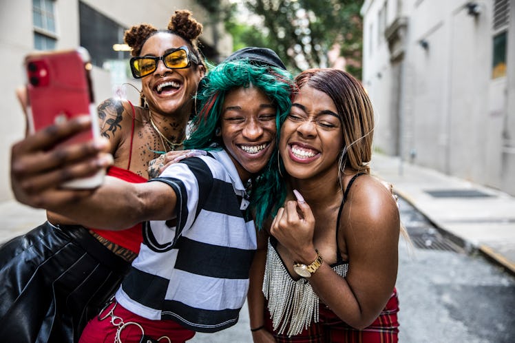 Young women taking a selfie in urban area