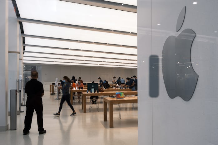 NEW YORK, NEW YORK - JULY 29: People visit the Apple store in the Oculus Mall in Manhattan on July 2...