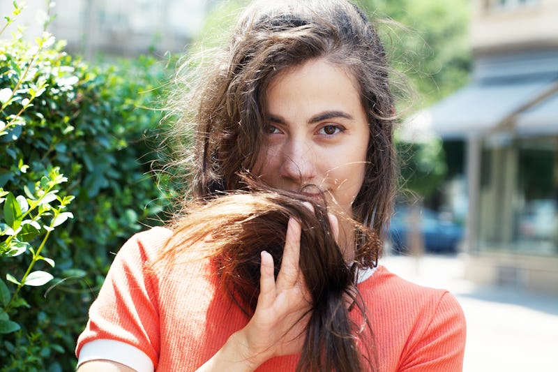 Young woman showing her hair