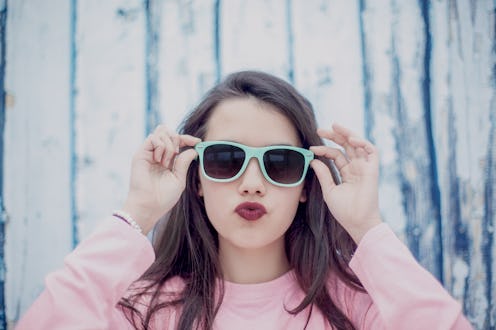 brunette teen with cool sunglasses
