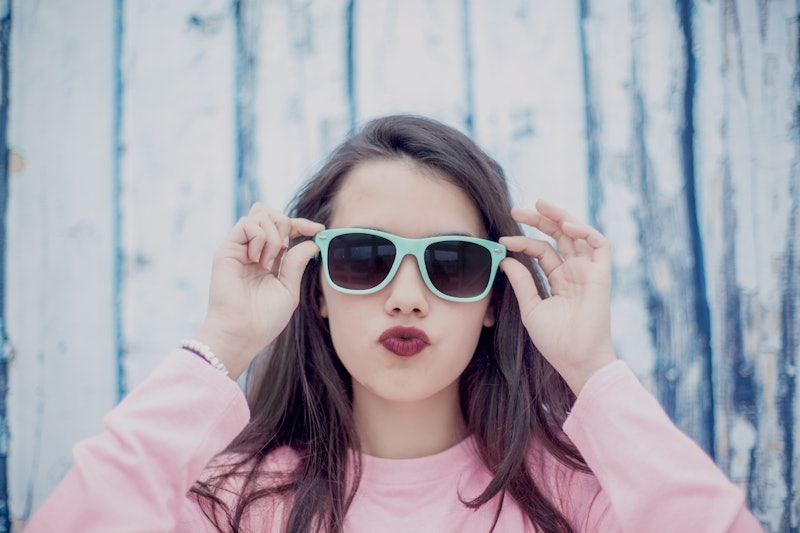 brunette teen with cool sunglasses