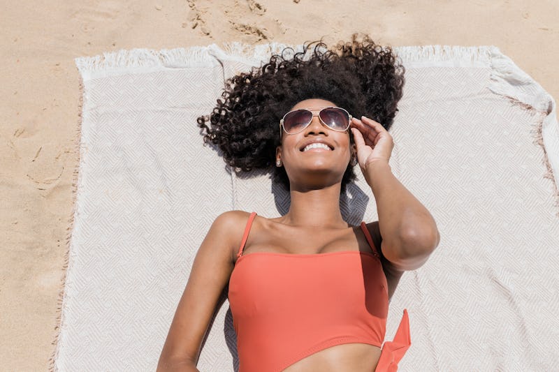 woman relaxing at the beach