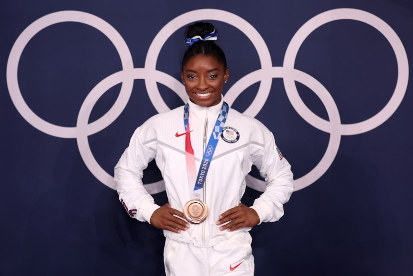 TOKYO, JAPAN - AUGUST 03: Simone Biles of Team United States poses with the bronze medal following t...