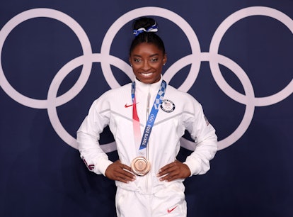 TOKYO, JAPAN - AUGUST 03: Simone Biles of Team United States poses with the bronze medal following t...