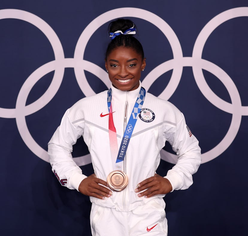 TOKYO, JAPAN - AUGUST 03: Simone Biles of Team United States poses with the bronze medal following t...