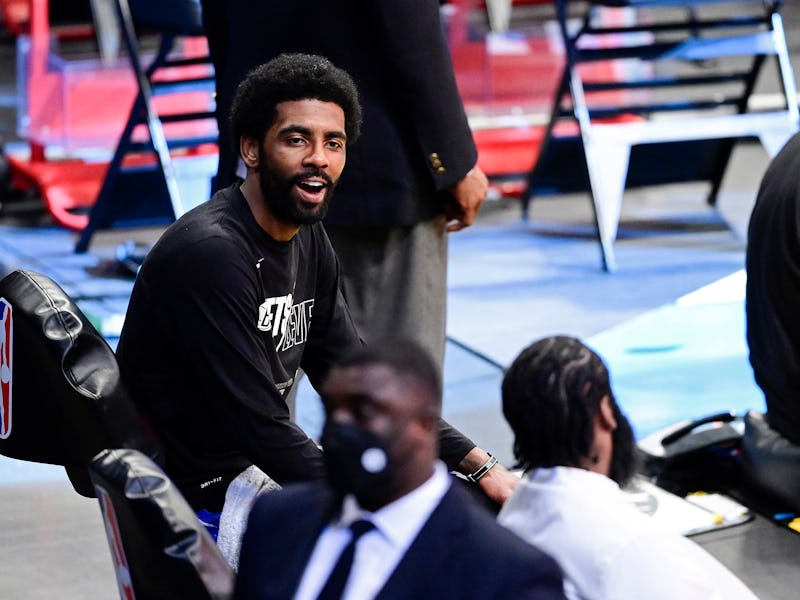 NEW YORK, NEW YORK - JUNE 07: Kyrie Irving #11 and James Harden #13 of the Brooklyn Nets share a la...