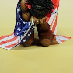 US athlete Chaunte Lowe celebrates winning the gold medal in the women's high jump final at the 2012...