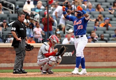 NEW YORK, NEW YORK - AUGUST 29: Javier Baez #23 of the New York Mets reacts after hitting a two run ...