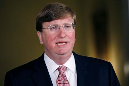 Mississippi Republican Gov. Tate Reeves delivers a televised address prior to signing a bill retirin...