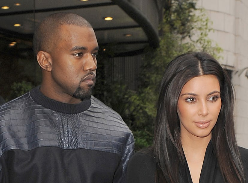 LONDON, ENGLAND - MAY 22: Kim Kardashian and her boyfriend Kanye West leave their hotel on May 22, 2...