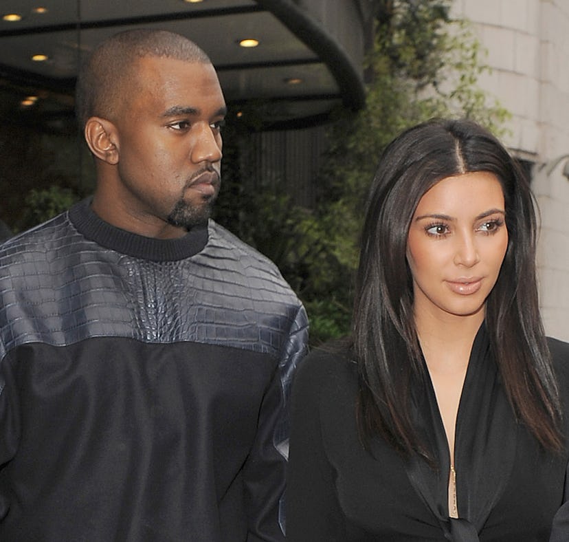 LONDON, ENGLAND - MAY 22: Kim Kardashian and her boyfriend Kanye West leave their hotel on May 22, 2...