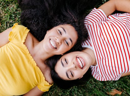 two women smiling and thinking about the friendship compatibility between taurus and libra