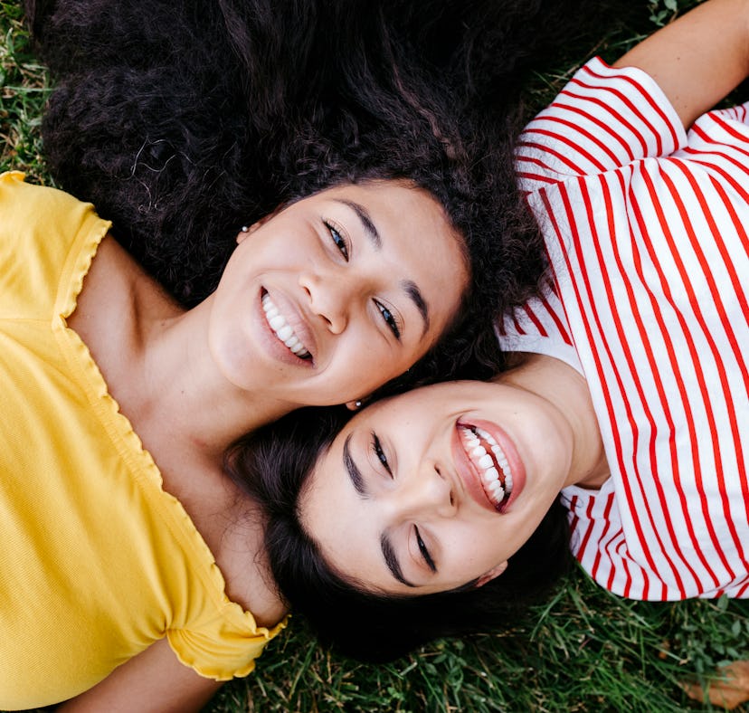 two women smiling and thinking about the friendship compatibility between taurus and libra