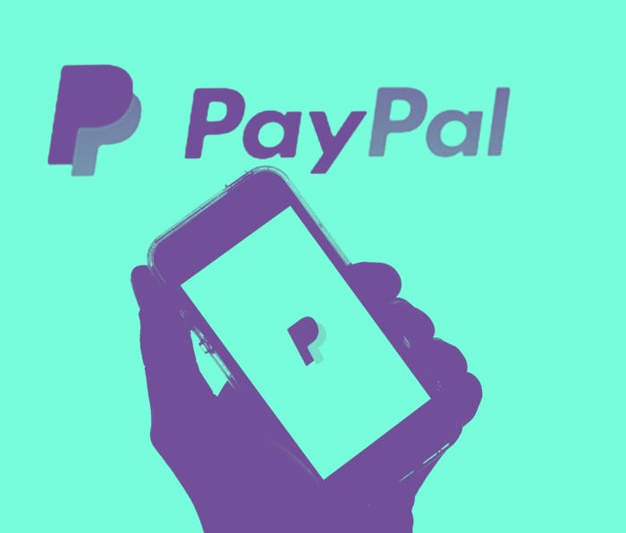 SPAIN - 2021/05/19: In this photo illustration a PayPal logo seen displayed on a smartphone with the...