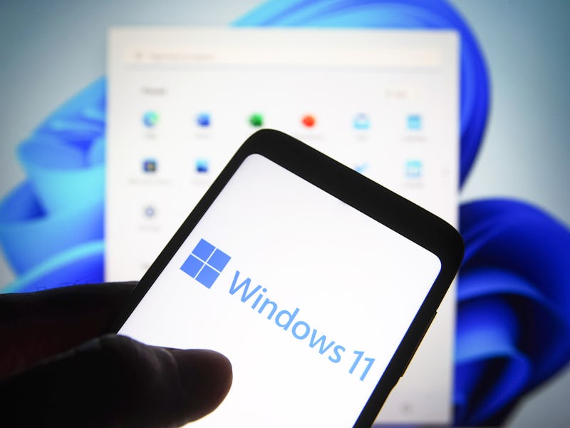 UKRAINE - 2021/06/24: In this photo illustration a Windows 11 logo is seen on a smartphone screen wi...