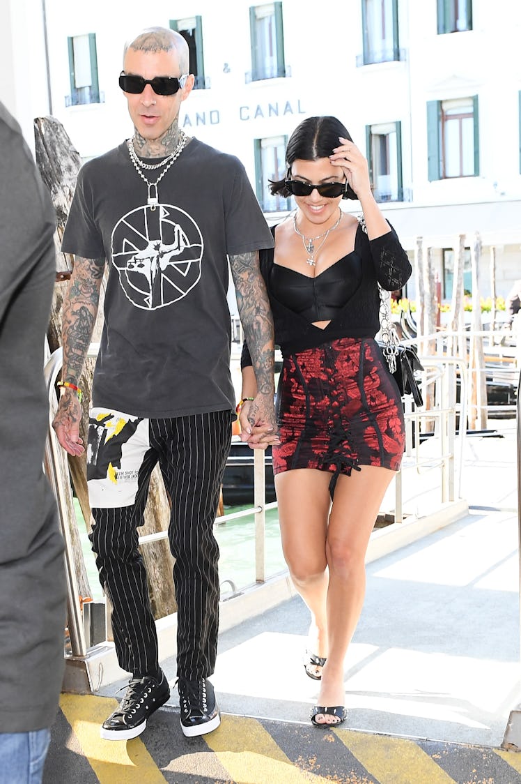Kourtney Kardashian and Travis Barker are seen walking and smiling on August 29, 2021 in Venice, Ita...