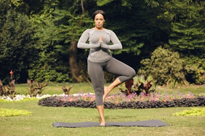 Tree pose involves stand on one leg, with other leg bent.