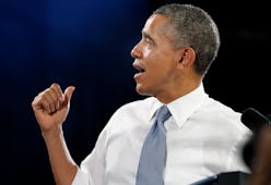 President Obama turned to address a man yelling about his family in the crowd. President Obama spoke...