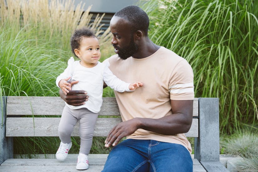 dad with baby girl outside