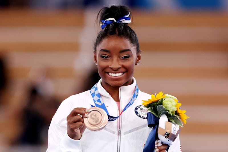 TOKYO, JAPAN - AUGUST 03: Simone Biles of Team United States poses with the bronze medal during the ...