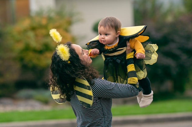 mom and baby in matching bee costumes