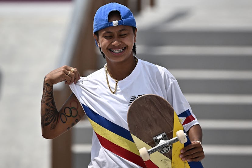 Philippines' Margielyn Arda Didal reacts after competing in the skateboarding women's street final o...