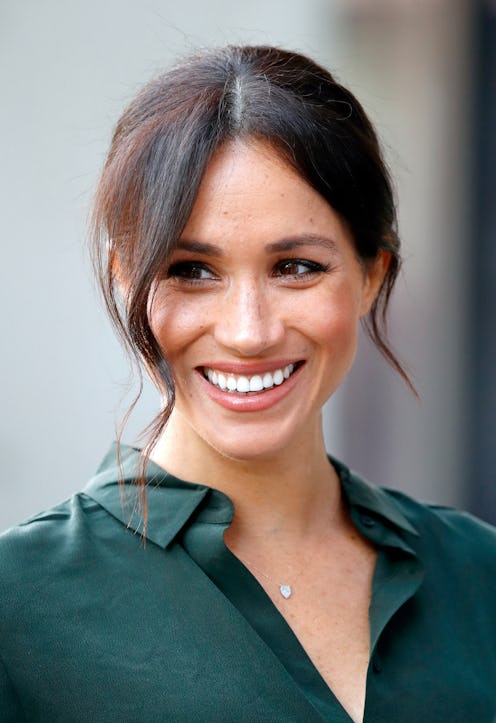 Meghan Markle wears a dainty necklace when visiting the University of Chichester's Engineering and T...