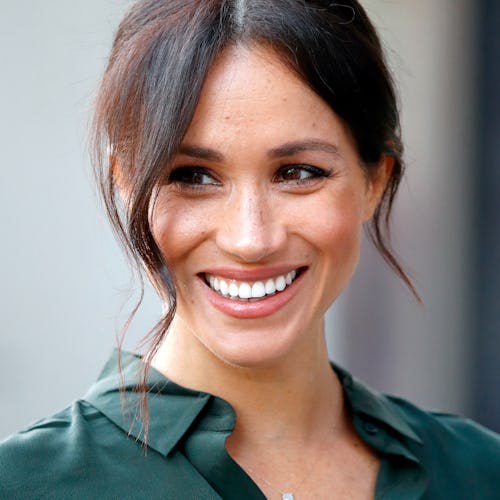Meghan Markle wears a dainty necklace when visiting the University of Chichester's Engineering and T...