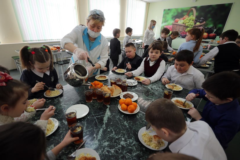 IVANOVO, RUSSIA - MARCH 12, 2021: Children have lunch in a canteen at secondary school No 14. Vladim...