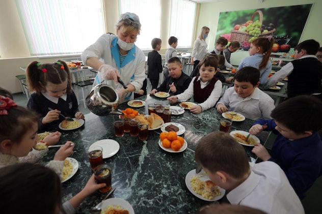 IVANOVO, RUSSIA - MARCH 12, 2021: Children have lunch in a canteen at secondary school No 14. Vladim...