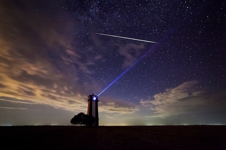 Bright meteor over the lighthouse during the Perseid meteor shower