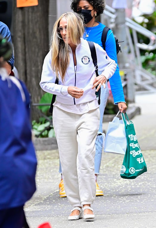 Sarah Jessica Parker wears Les Tien classic sweatpants as Carrie Bradshaw on the set of And Just Lik...