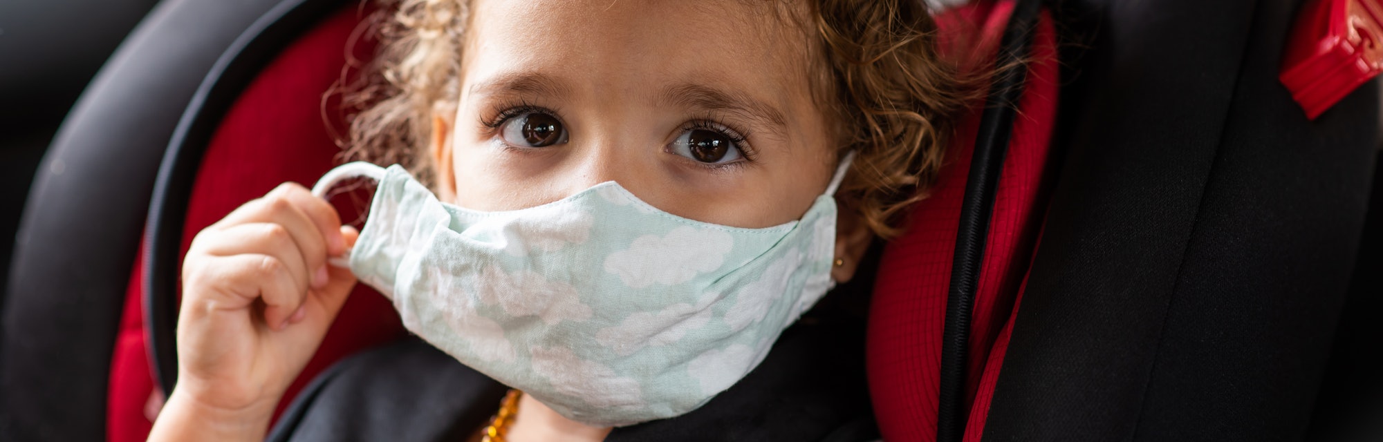Child wearing face mask - coronavirus