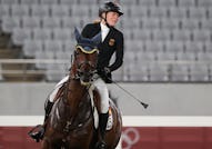 TOKYO, JAPAN - AUGUST 6, 2021: Germany's Annika Schleu competes in the women's individual riding sho...