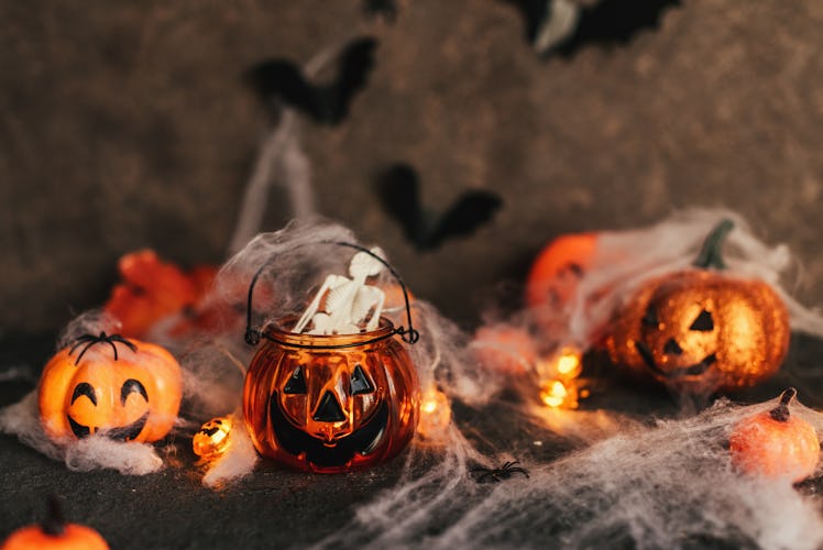 Target's Halloween 2021 decorations include so many spooky sculptures of cats, owls, and skulls.