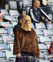 GLASGOW, SCOTLAND - JUNE 14: A Scotland fan dressed as Star Wars character Chewbacca is seen during ...