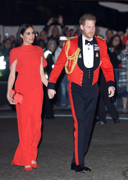 Meghan Markle and Prince Harry's complementary outfits prove they are always in sync when it comes t...