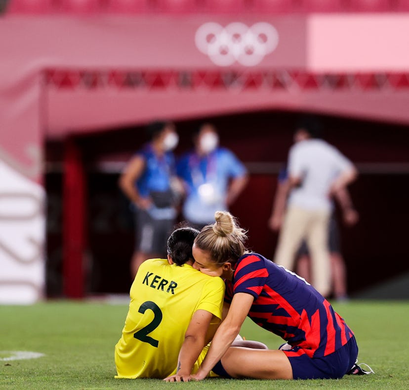 Olympians Sam Kerr and Kristie Mewis confirm their romance with a PDA-filled Instagram post.