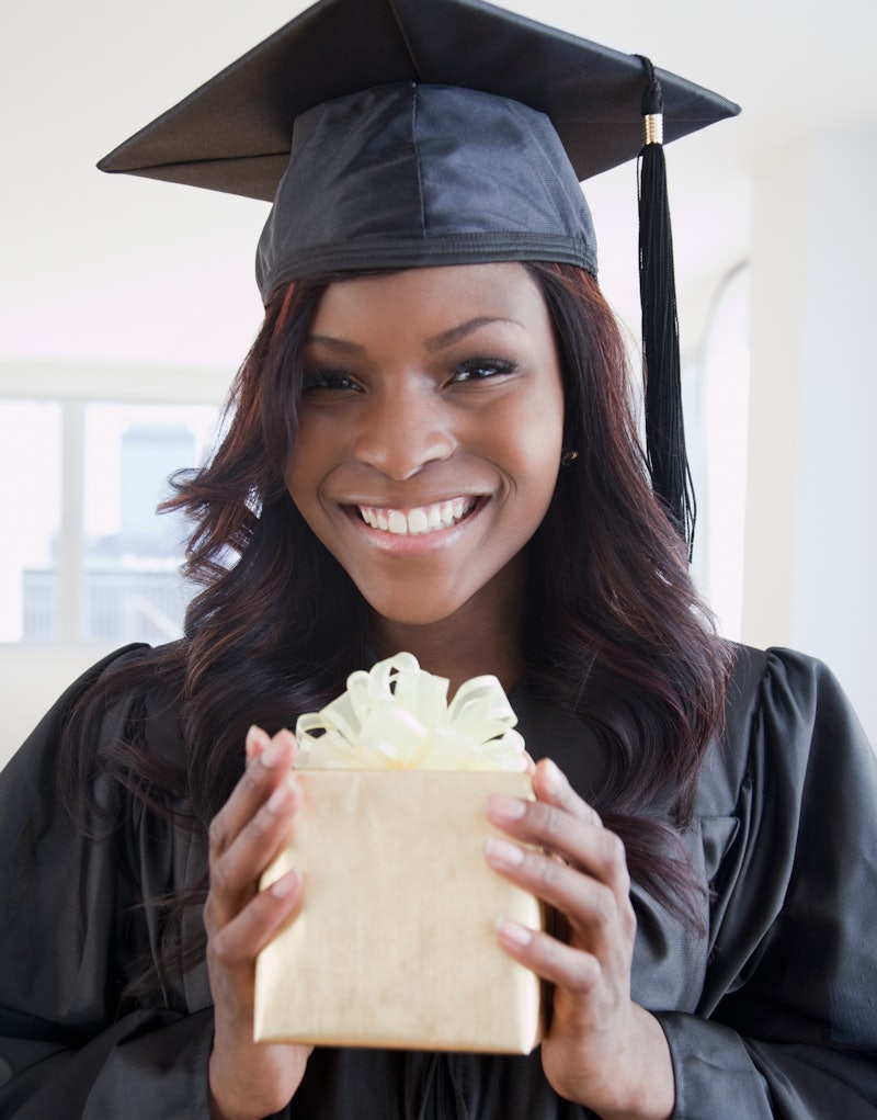 woman with a gift on her graduation 