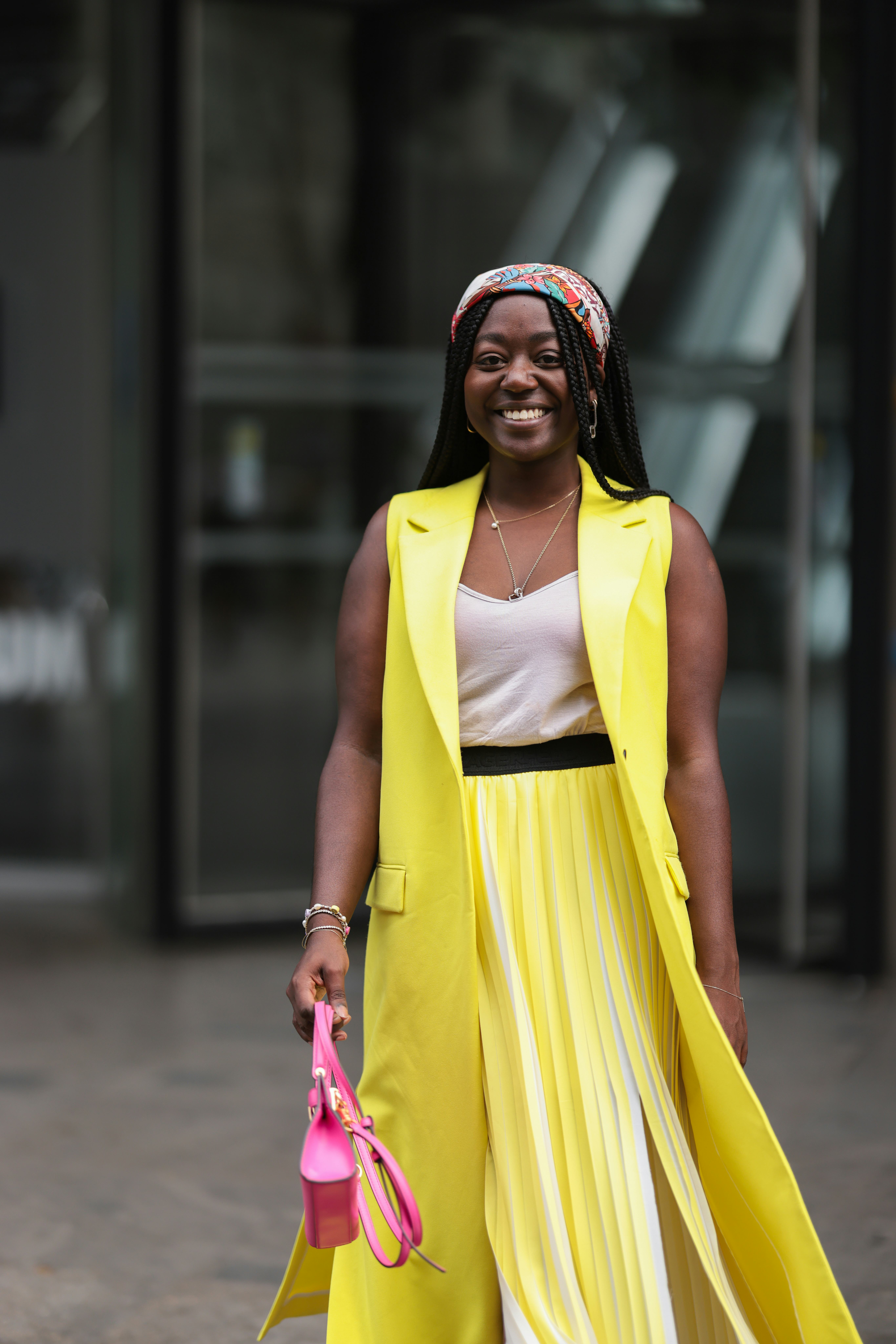 Lois Opoku demonstrates one of the many ways to wear a bandana or patterned scarf.