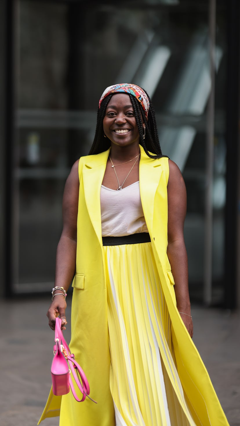 Lois Opoku demonstrates one of the many ways to wear a bandana or patterned scarf.